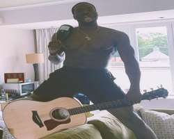 He also plays the guitar in his free time.